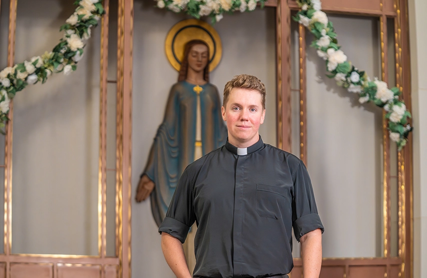 Fr. Dale smiles into the camera.