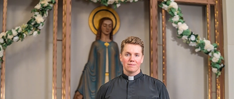 Fr. Dale smiles into the camera.