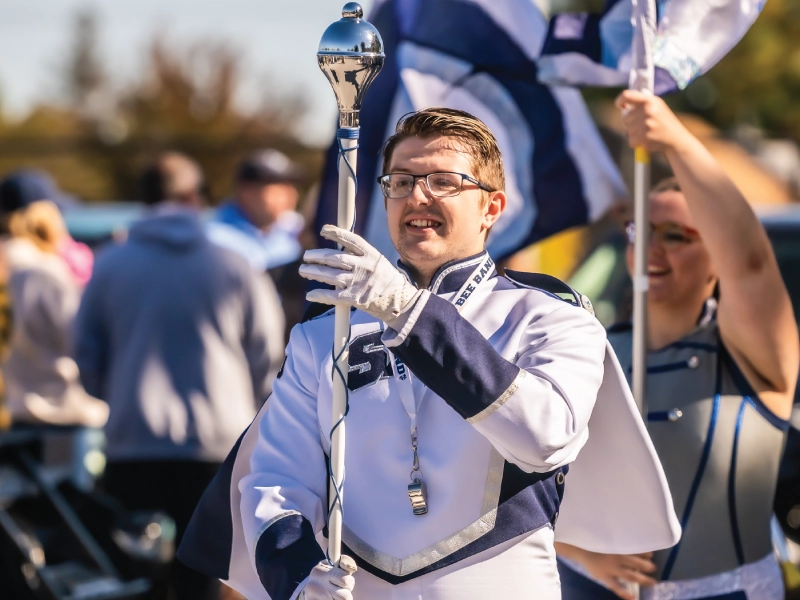 Marching band outdoors during Homecoming.