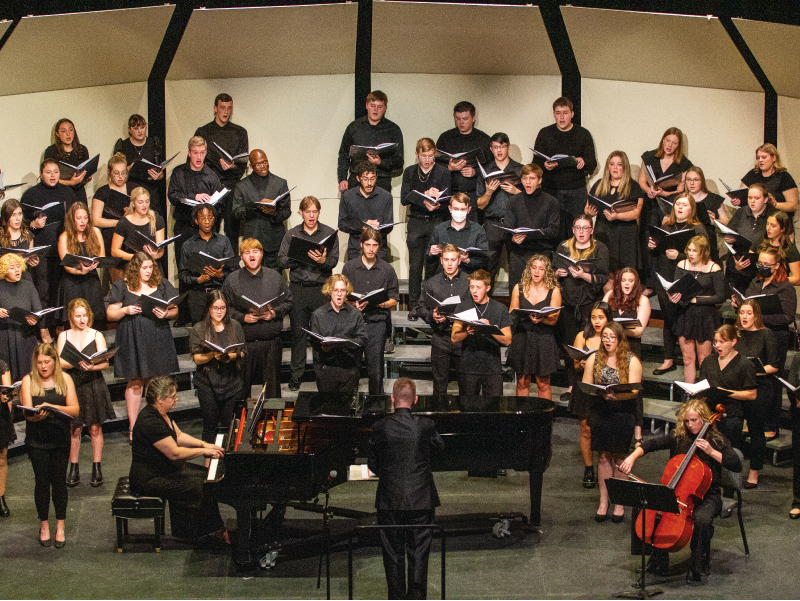 Student choir performing in Galvin Fine Arts Center at St. Ambrose University.