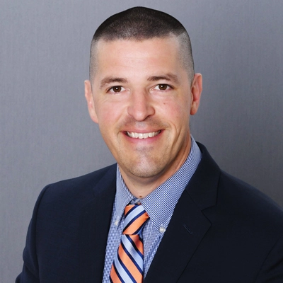 Lane McMullen smiles into the camera.