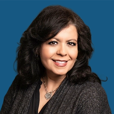 Matha Garcia Tappa smiles into the camera.